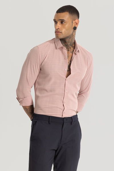 light pink shirt with grey pants